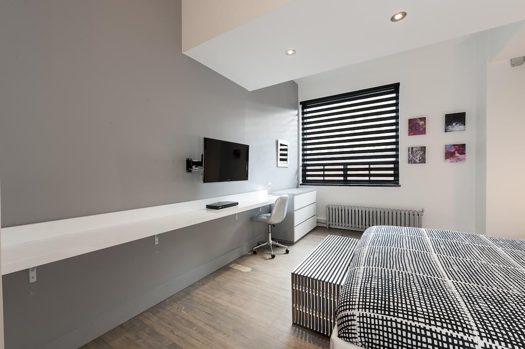 The Executive Loft At The Holland Hotel มอนทรีอัล ห้อง รูปภาพ